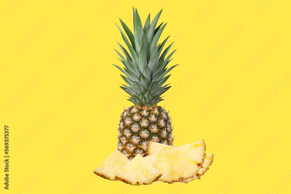Whole juicy fresh pineapple. Pieces of pineapple half, quarter. On a yellow background. Whole juicy fresh pineapple. Pieces of pineapple half, quarter. On a yellow background.