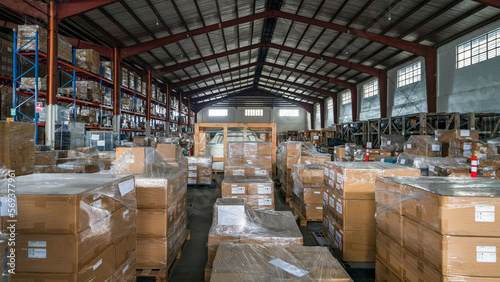 Stack of carton boxes at logistics warehouse © hit1912