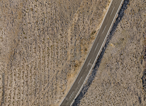 Road on the bare plateau of the island of Pag photo