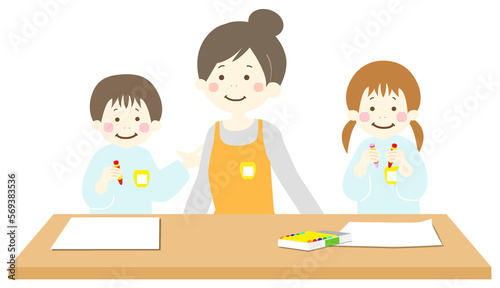 お絵描きする園児と先生