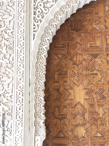 intricate carving of stone and wood in a european city