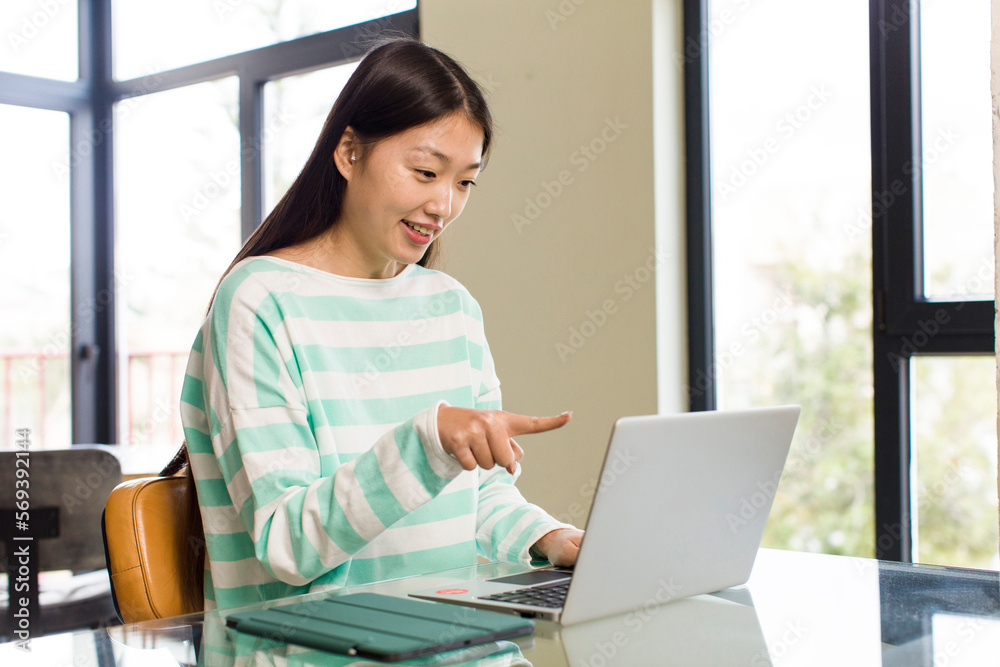asian pretty telemarketer woman and teleconmmuting concept