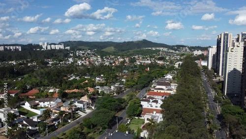 Aerial Shot Flying Over Big Luxury Houses In a Condominium photo