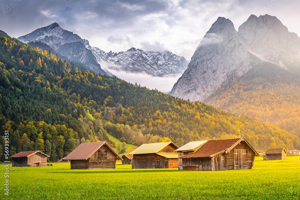 Bavarian alps and rustic farm barn, Garmisch, Zugspitze massif, Bavaria, Germany