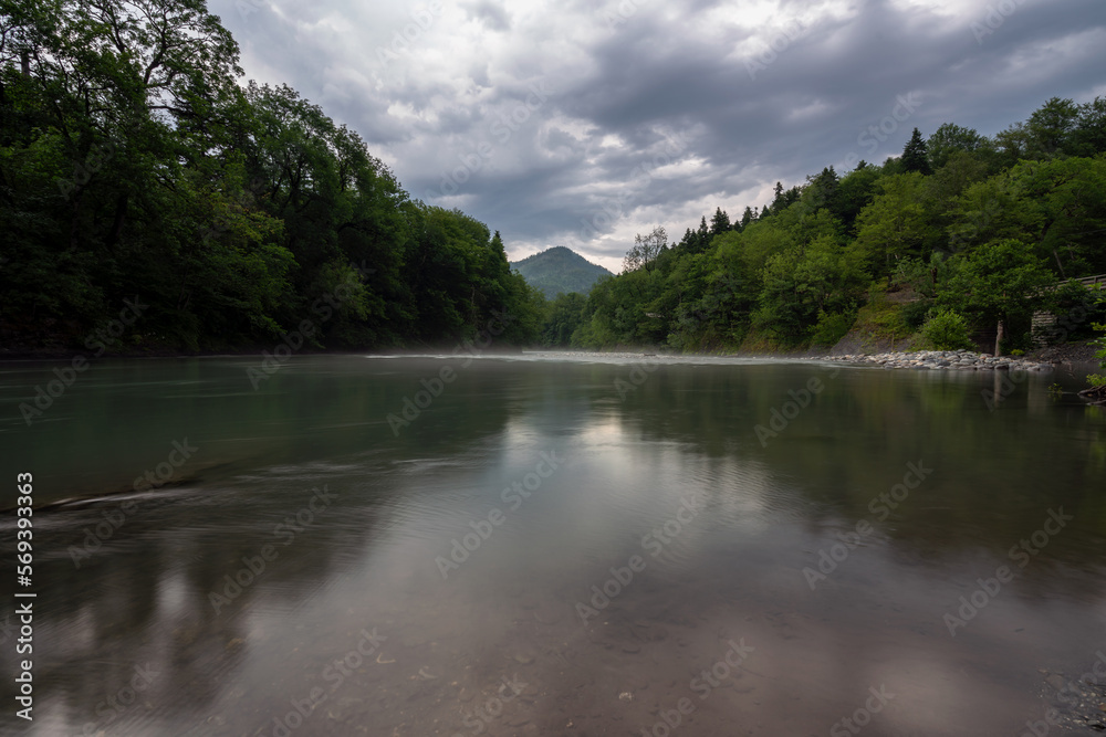 Belaya River canyon on the territory of the Caucasian Biosphere Reserve on the Guzeripl cordon on a sunny summer day with clouds, Guzeripl, Republic of Adygea, Russia