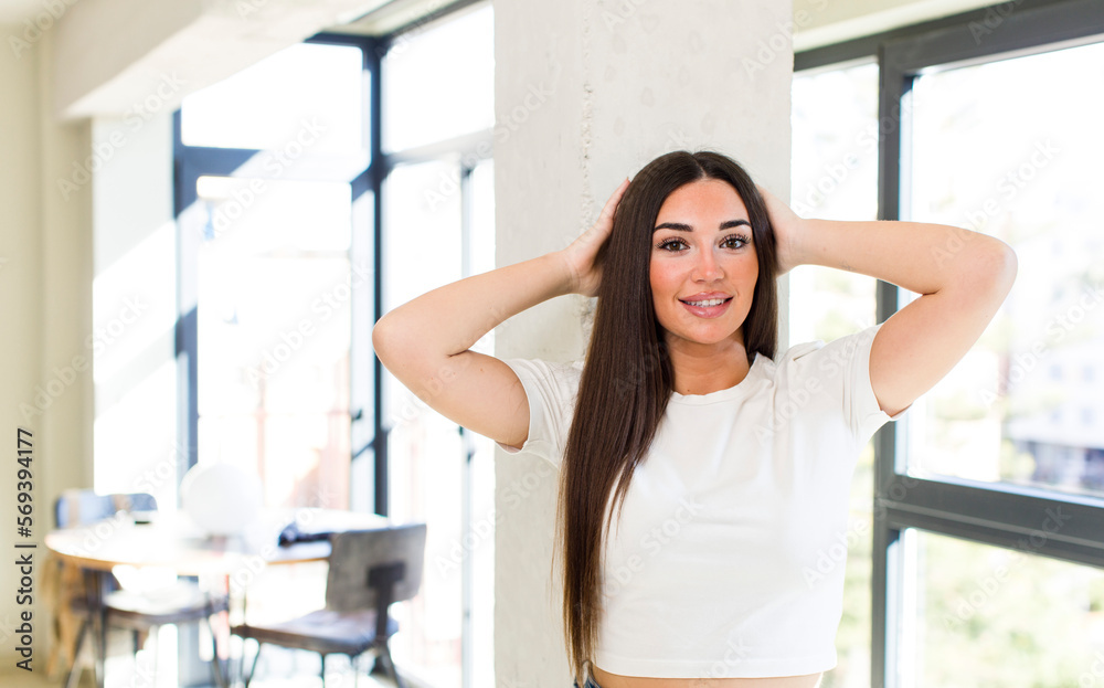 young adult pretty woman feeling stressed, worried, anxious or scared, with hands on head, panicking at mistake young adult pretty woman feeling stressed, worried, anxious or scared, with hands on head, panicking at mistake