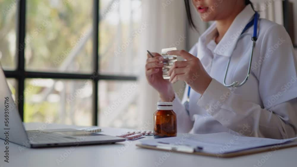 Close up of doctor's hands is explaining and advising about using pills medicine and treatment to patient. Close up of doctor's hands is explaining and advising about using pills medicine and treatment to patient.