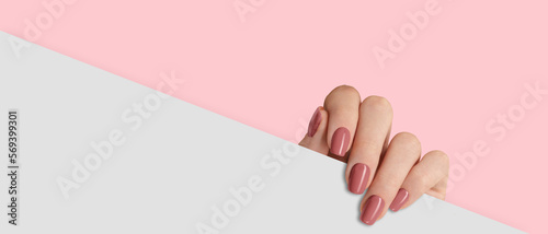 Photo Female hand with red nail design