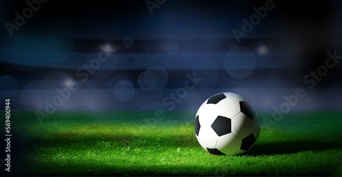 Soccer ball on the grass. Sport background. © arsenypopel