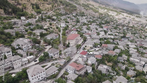 Drone flight over UNESCO world heritage city Gjirokaster, Albania photo