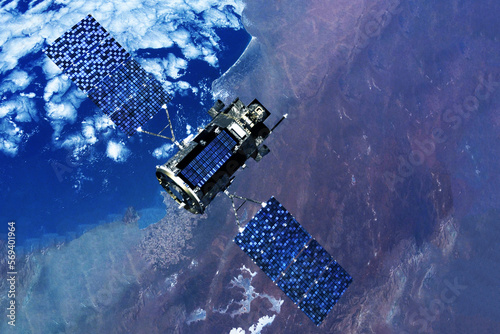 Fototapeta Naklejka Na Ścianę i Meble -  Space satellite above the earth in space. Elements of this image furnished by NASA