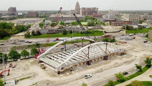 Construction of second Avenue Bridge in Detroit city, aerial drone orbit view photo