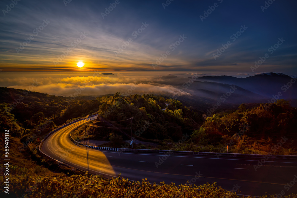 Fototapeta premium Scenery of the sunrise viewpoint in early morning of a winter season at the km 41, Doi Inthanon National Park, Chiang Mai, Thailand. Landscape photography of Chiang Mai.