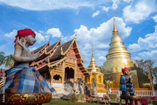 Wat Phra Singh temple and wood carving in the old town center of Chiang Mai,Thailand. It is an important religious and tourist photo