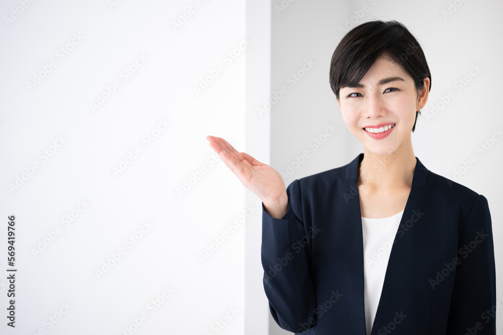 Business-friendly Asian woman in a camera-friendly suit. recommend Business-friendly Asian woman in a camera-friendly suit. recommend