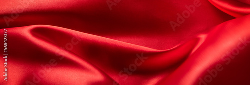 ドレープのある赤い布地の背景テクスチャー