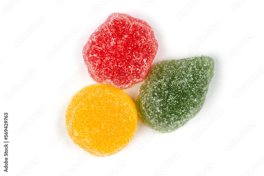 Three multi-colored marmalades on a white background. Sweet candy marmalade. Three multi-colored marmalades on a white background. Sweet candy marmalade.