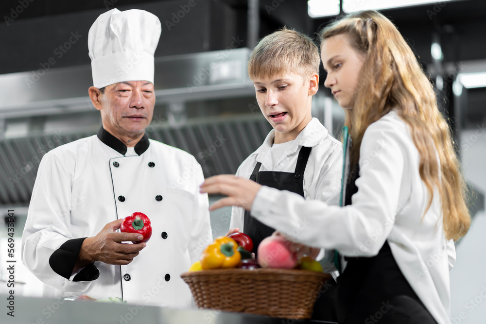Students are learning to cook in a culinary institute with a standard kitchen and complete equipment. And have a professional chef as a trainer. Students are learning to cook in a culinary institute with a standard kitchen and complete equipment. And have a professional chef as a trainer.