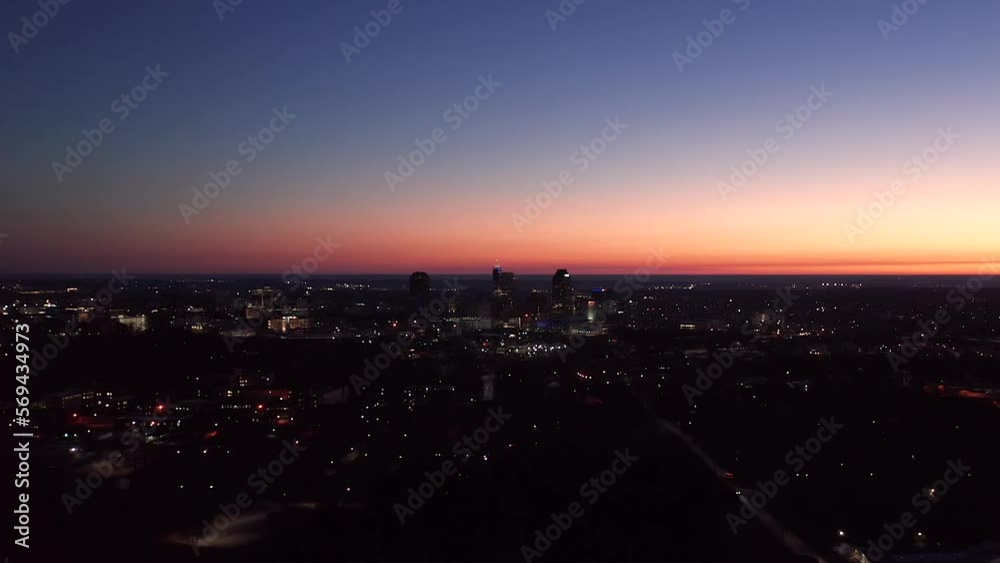 Raleigh North Carolina at night. Blue hour aerial establishing shot. Raleigh North Carolina at night. Blue hour aerial establishing shot.
