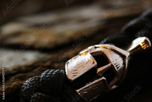 Spartan helmet on a paracord strap.