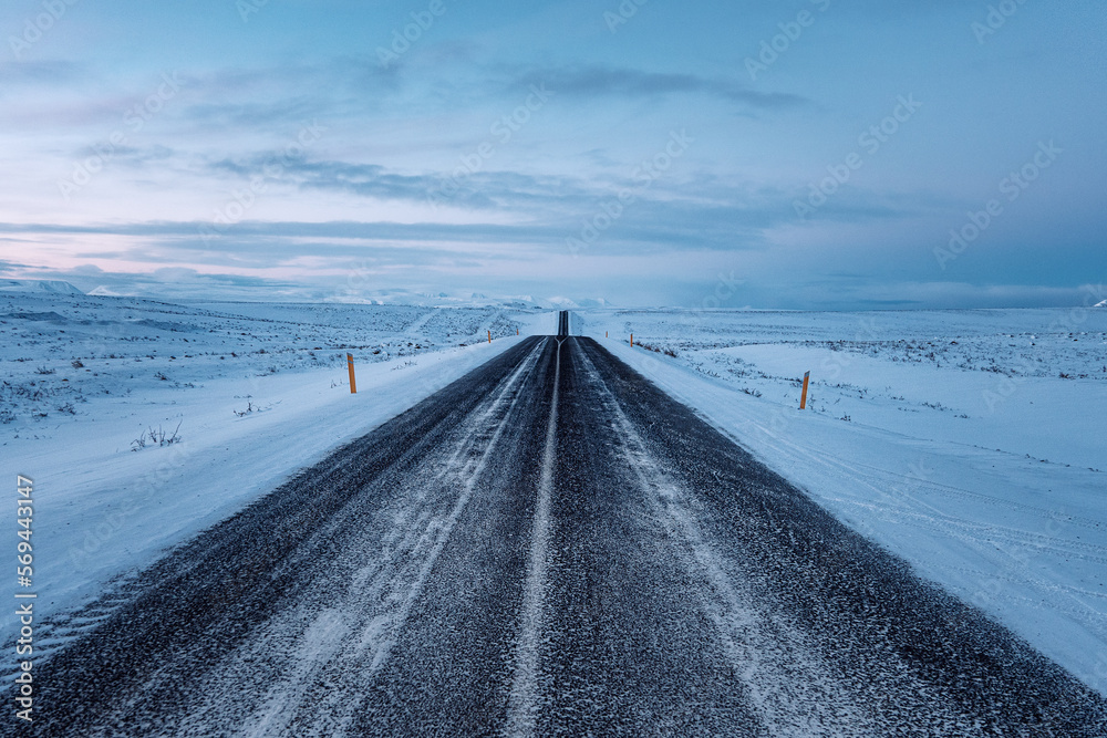 Iceland sunset over winter panorama road snow landscape