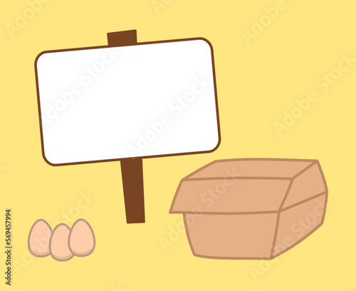 Small pack of fresh eggs with promotional sign on yellow background