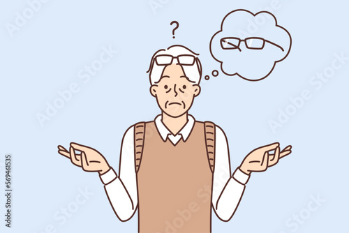 Sad man spreads arms thinking about glasses that have ceased to solve vision problems