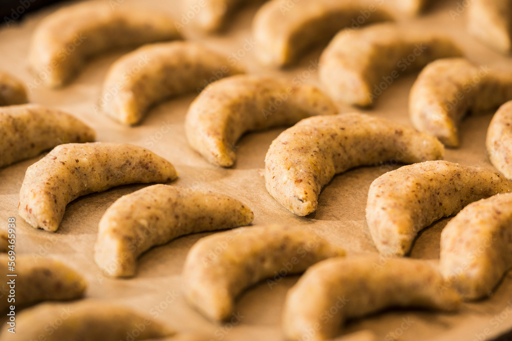 Close-up of vanilla crescents in baking tray for baking, Munich, Bavaria, Germany Close-up of vanilla crescents in baking tray for baking, Munich, Bavaria, Germany
