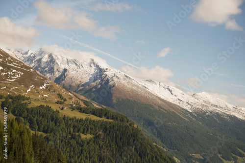 Low angle view of grossglockner mountain range against cloudy sky , Austria Alps, Carinthia,  Austria