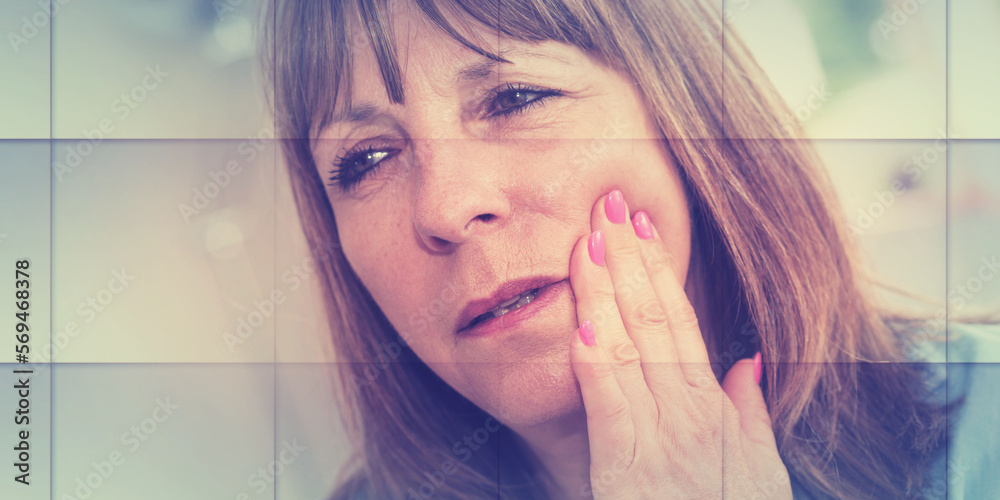 Portrait of mature woman with toothache, geometric pattern Portrait of mature woman with toothache, geometric pattern