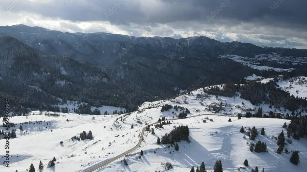 Aerial winter view of Rhodope Mountains around village of Stoykite and Pamporovo, Smolyan Region, Bulgaria Aerial winter view of Rhodope Mountains around village of Stoykite and Pamporovo, Smolyan Region, Bulgaria