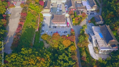 Aerial video of Gakwonsa temple during Autumn season in Cheonan city, South Korea. Aerial shot from drone. photo