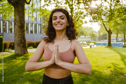 Young middle eastern woman doing exercise during yoga practice