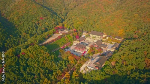 Aerial video of Gakwonsa temple during Autumn season in Cheonan city, South Korea. Aerial shot from drone. photo