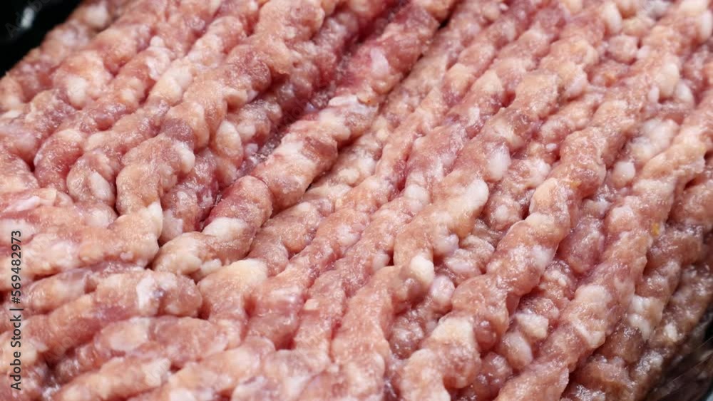 Fresh red pork minced meat circle rotation close up Fresh red pork minced meat circle rotation close up