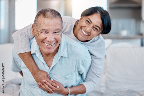 Love, retirement and portrait with an old couple in the living room of their home together to relax. Sofa, bonding or marriage with a senior man and woman relaxing in the lounge of their house