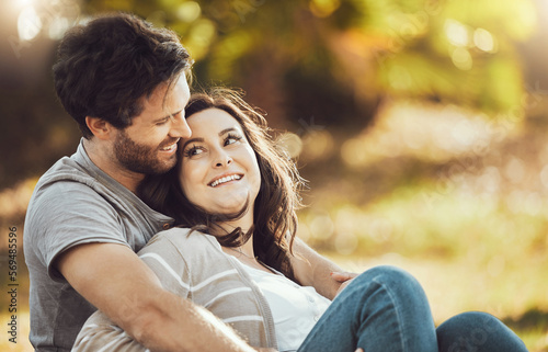 Billede på lærred Love, couple and relax at park, laughing at funny joke or comic comedy and having fun time together outdoors