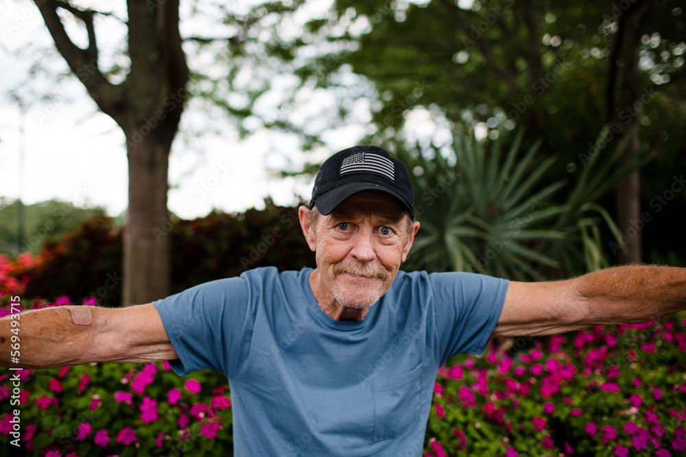 Man with Dementia Posing for Camera in Cincinnati Man with Dementia Posing for Camera in Cincinnati