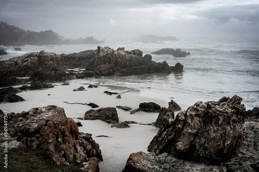 Misty overcast conditions along the Walker Bay coastline. Hermanus, Whale Coast, Overberg, Western Cape, South Africa.