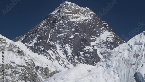 Beautifull Everest mountain landscape at the Everest Base Camp trek in the Himalaya, Nepal. Himalaya landscape and mountain views. Pan footage - camera moving up.