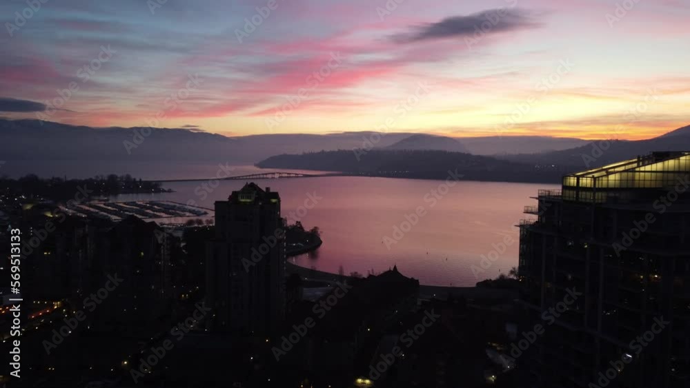 drone shot of kelowna Okanogan lake shore with sunset drone shot of kelowna Okanogan lake shore with sunset