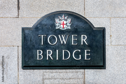 Tower bridge street sign on a wall in London, UK photo