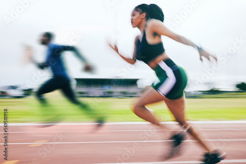 Black woman, running and athletics in sports race for training, cross fit or exercise in blur on stadium track. African American female runner athlete in fitness, sport or speed run for competition