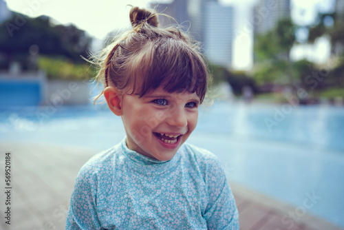 Photography child in kuala lumpur malaysia on the playground twin towers