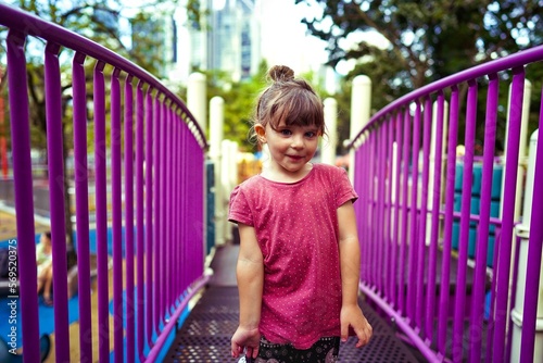 Photography child in kuala lumpur malaysia on the playground twin towers