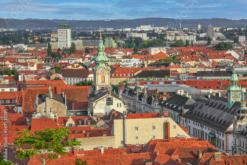 Graz, Austria - July 12th, 2021: Beautiful panoramic view to the old town of Graz, popular travel destination in Austria