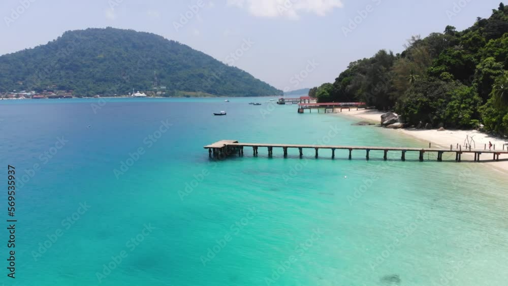 Drone view of sea harbors and greenery on Perhantian Island Drone view of sea harbors and greenery on Perhantian Island