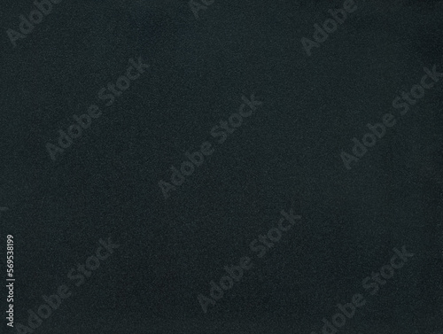 Dark black background with noise speckles