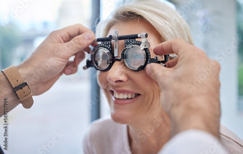 Hands, help or woman in eye exam or vision test for eyesight by doctor, optometrist or ophthalmologist. Optician helping a happy customer to see or check glaucoma or retina health in a consultation