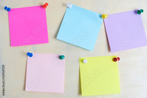 Colorful stickers for written notes are fixed plywood board.